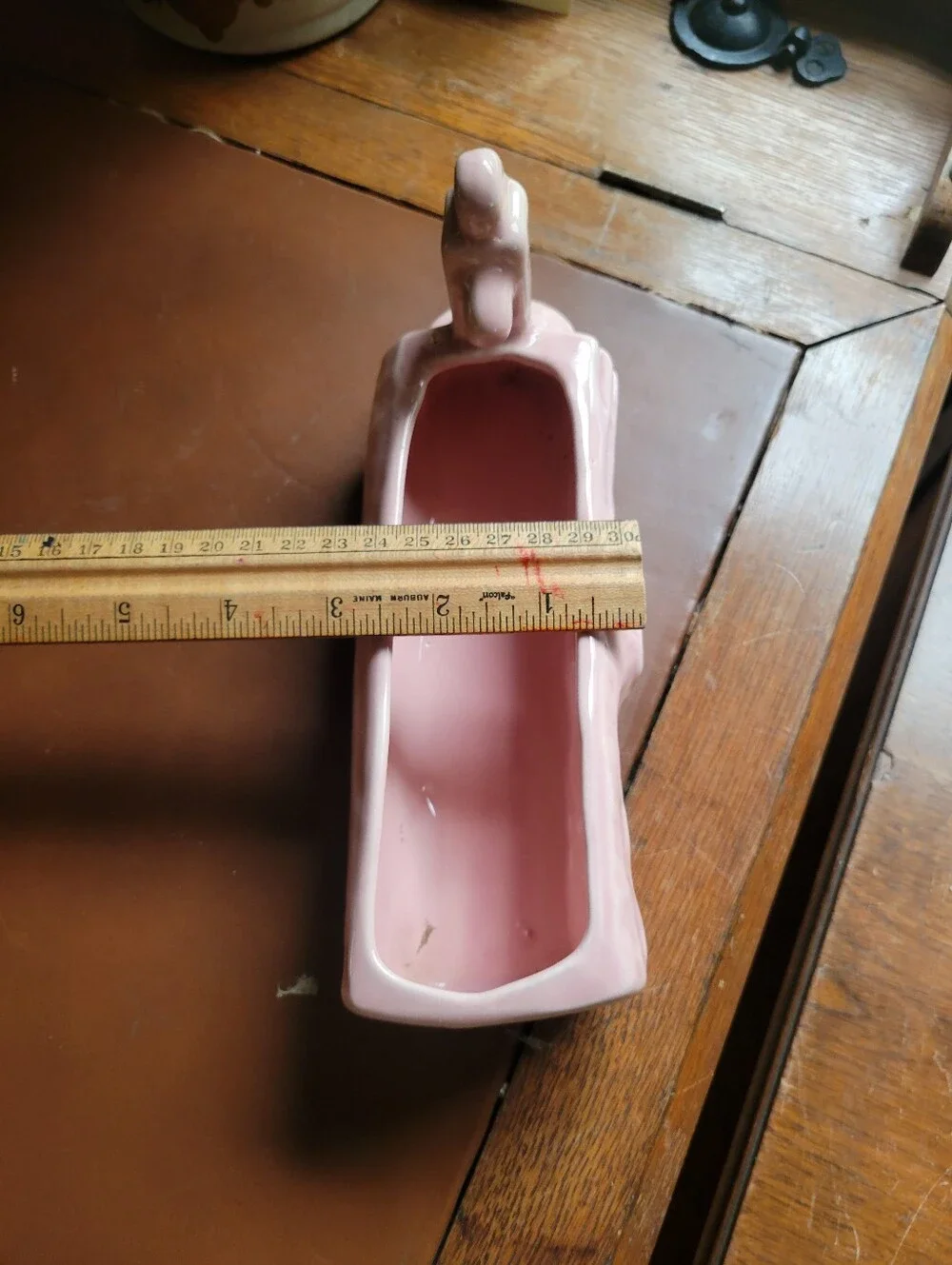 Vintage pink log trough with water pump flower pot